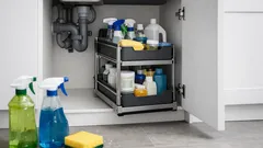 The two-tier under-sink organiser that finally fixed my kitchen cupboard chaos